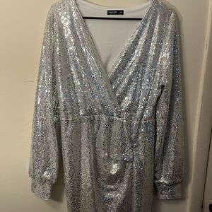 Silver sequence dress perfect for a party. Stretchy material